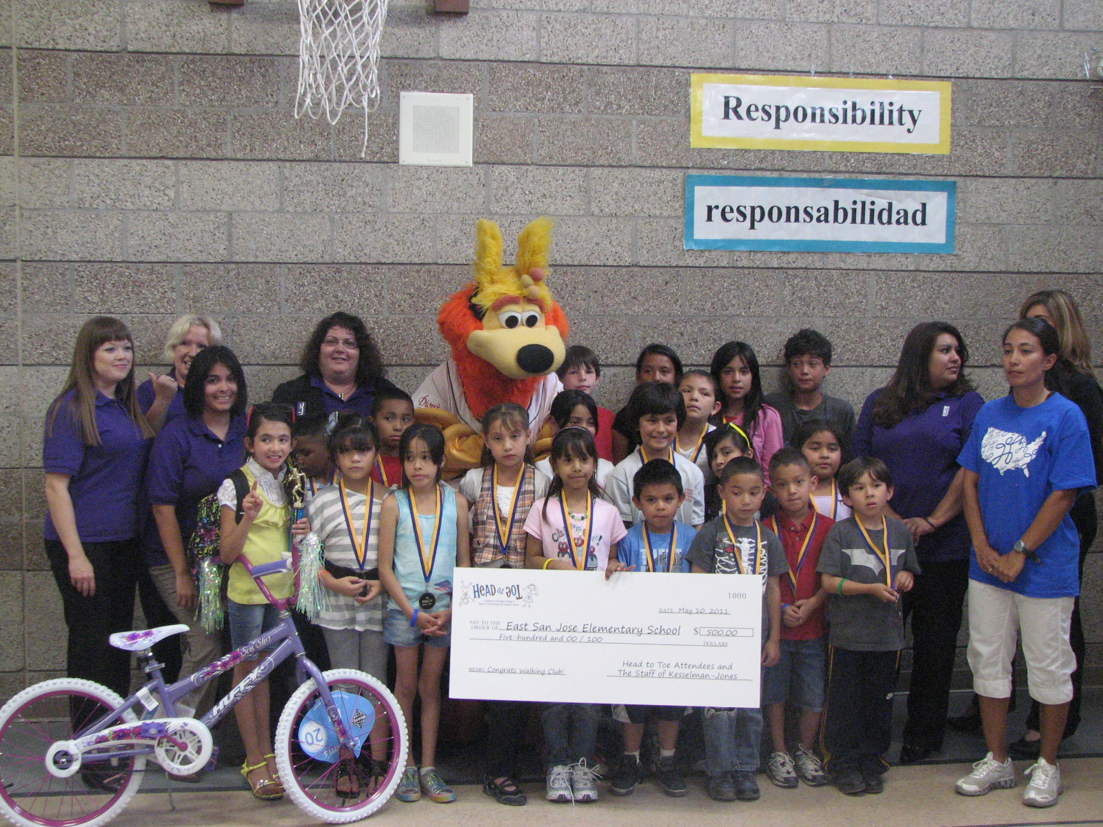 East San Jose Elementary School poses with check and Orbit