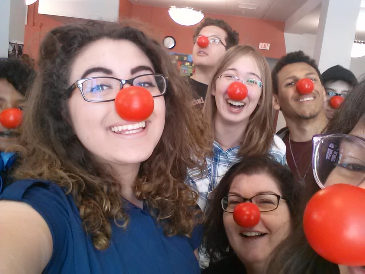 Laura Kesselman and team wear Red Noses for Red Nose Day