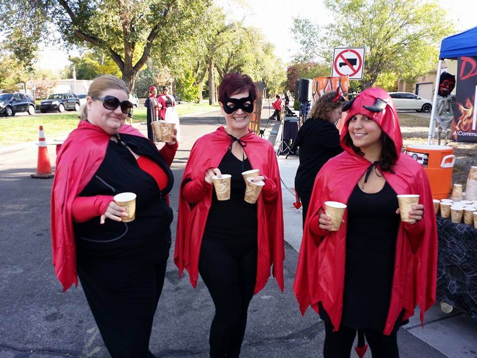 Several women dressed as Devils for Day of the Tread